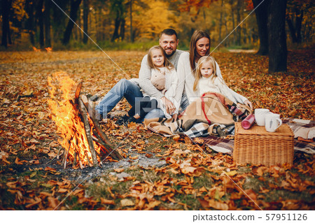 Family with cute kids in a autumn park 57951126