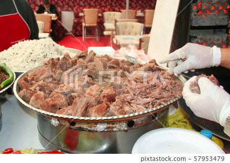 prepearing the kavurma, famous turlkish meal 57953479