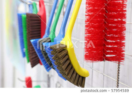 plastic cleaning brushes in supermarket hanger ; plastic cleaning brushes in supermarket hanger ; 57954589