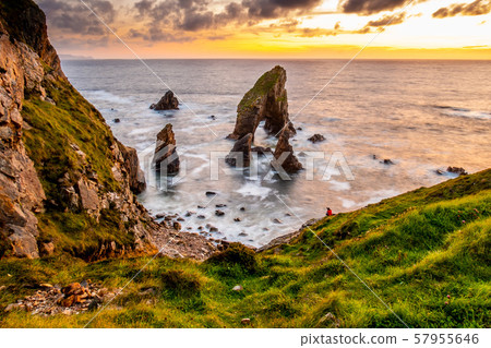 Long tme exposure of Crohy Head Sea Arch Breeches during sunset - County Donegal, Ireland 57955646