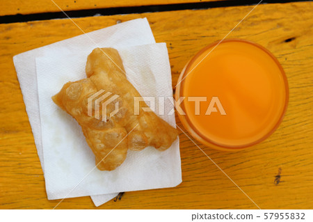 Orange juice glass on wood with top view for breakfast 57955832
