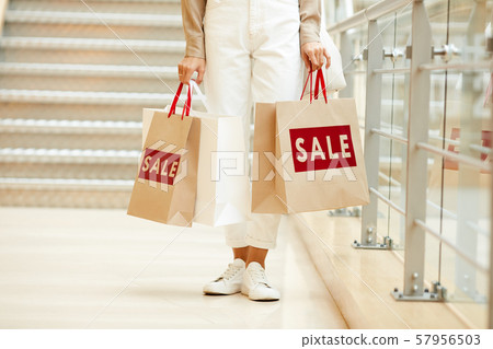 Woman buying in the mall Woman buying in the mall 57956503