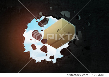 3d rendering of closed cardboard box breaking black wall 3d rendering of closed cardboard box breaking black wall 57956819