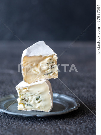 Soft cheese with white and blue mold Soft cheese with white and blue mold 57957594