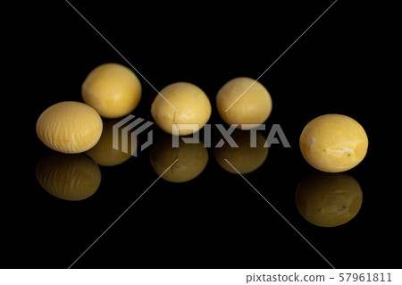 Raw yellow soya bean isolated on black glass 57961811