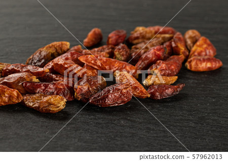 Dry red pepperoncino pepper on grey stone 57962013