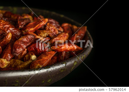 Dry red pepperoncino pepper isolated on black Dry red pepperoncino pepper isolated on black 57962014