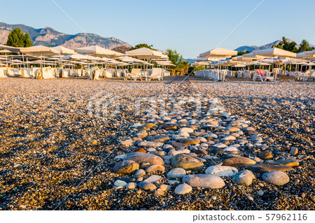 An empty pebble beach 57962116