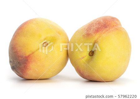 Fresh fuzzy peach isolated on white Fresh fuzzy peach isolated on white 57962220