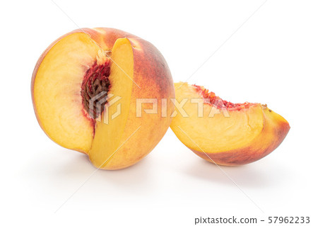 Fresh fuzzy peach isolated on white Fresh fuzzy peach isolated on white 57962233