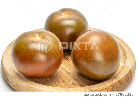 Fresh green red tomato isolated on white Fresh green red tomato isolated on white 57962323