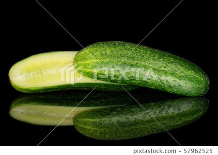 Fresh green cucumber isolated on black glass Fresh green cucumber isolated on black glass 57962525