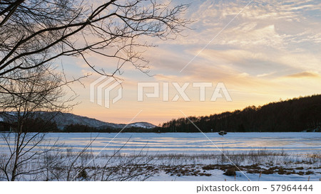 A frozen lake in the Winter, in Tateshina, Japan A frozen lake in the Winter, in Tateshina, Japan 57964444