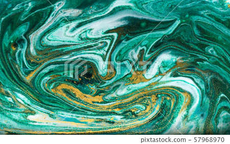 Green and gold marbling pattern. Golden powder marble liquid texture. Green and gold marbling pattern. Golden powder marble liquid texture. 57968970