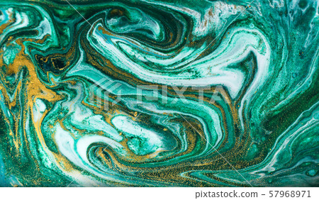 Green and gold marbling pattern. Golden powder marble liquid texture. Green and gold marbling pattern. Golden powder marble liquid texture. 57968971