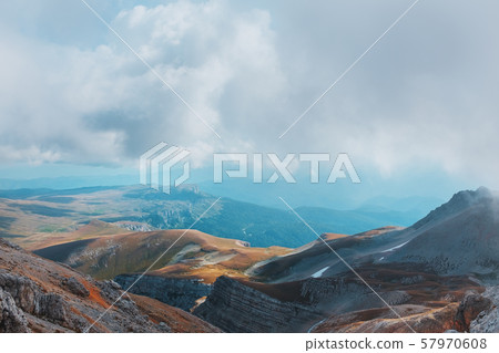 Route through mountain peaks and hills through 57970608