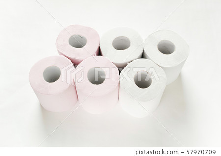 New white and pink toilet paper placed in two rows of 3 rolls in the center of the white background 57970709