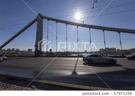 Krymsky Bridge or Crimean Bridge (winter day) is a steel suspension bridge in Moscow, Russia. The bridge spans the Moskva River 1800 metres south-west from the Kremlin Krymsky Bridge or Crimean Bridge (winter day) is a steel suspension bridge in Moscow, Russia. The bridge spans the Moskva River 1800 metres south-west from the Kremlin 57971199