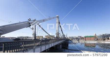 Krymsky Bridge or Crimean Bridge (winter day) is a steel suspension bridge in Moscow, Russia. The bridge spans the Moskva River 1800 metres south-west from the Kremlin Krymsky Bridge or Crimean Bridge (winter day) is a steel suspension bridge in Moscow, Russia. The bridge spans the Moskva River 1800 metres south-west from the Kremlin 57971200