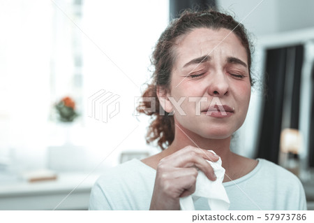 Wife crying while feeling allergic to much dusts at home Wife crying while feeling allergic to much dusts at home 57973786