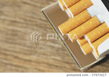 image of several commercially made cigarettes.  57973817