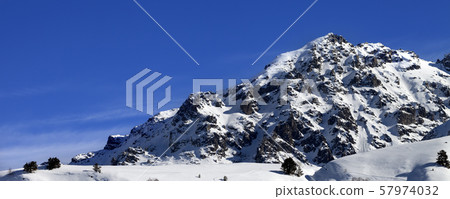 Off-piste slope with track from avalanche on sunny 57974032