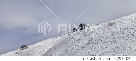 Off-piste slope in gray day Off-piste slope in gray day 57974043