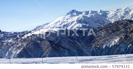 Ski slope in sunny morning Ski slope in sunny morning 57974131