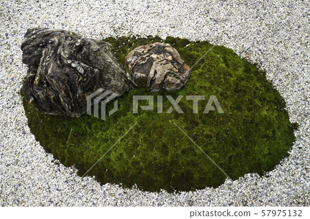 Natural stone landscaping in home garden 57975132