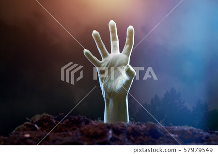 Image of zombie hand sticking out of grave Image of zombie hand sticking out of grave 57979549
