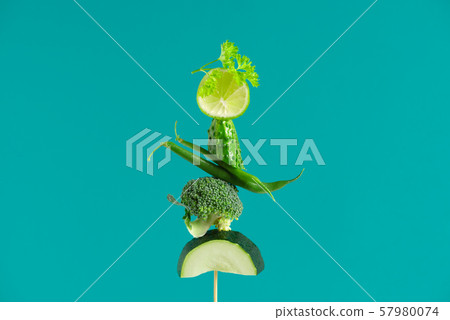Art composition of various fresh green vegetables 57980074