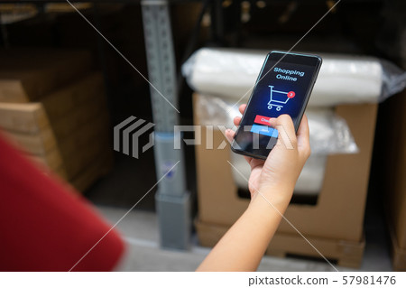 Online shopping with smartphone and shopping bags Online shopping with smartphone and shopping bags 57981476