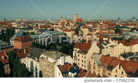 Low altitude aerial shot of Munich. Flight towards historic center. Germany Low altitude aerial shot of Munich. Flight towards historic center. Germany 57982150