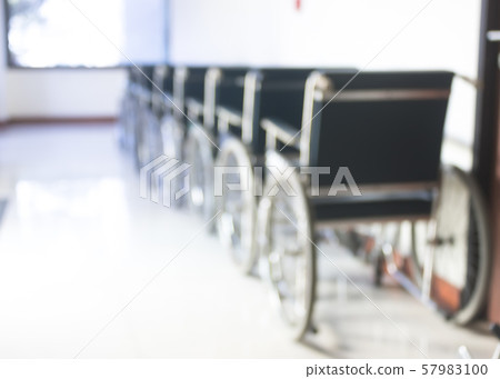 Blur abstract background view wheelchair seat row in empty hospital building interior Blur abstract background view wheelchair seat row in empty hospital building interior 57983100