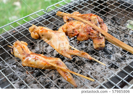 Close of up grilled chicken on the stove. Close of up grilled chicken on the stove. 57985806