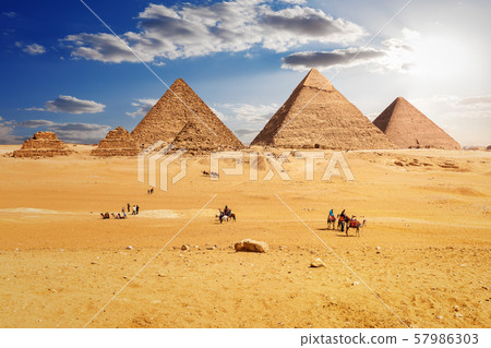 Bedouins near the Pyramids of Giza in Egypt Bedouins near the Pyramids of Giza in Egypt 57986303