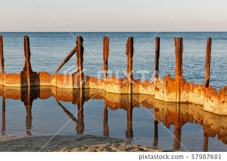 Confluence of Diane lake into Mediterranean sea. 57987681