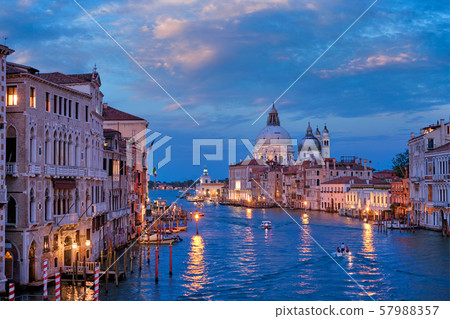 View of Venice Grand Canal and Santa Maria della Salute church in the evening 57988357