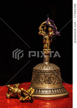 Tibetan Buddhist ritual objects - vajra and bell 57988386