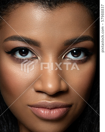 Closeup portrait of young beautiful black woman 57988837