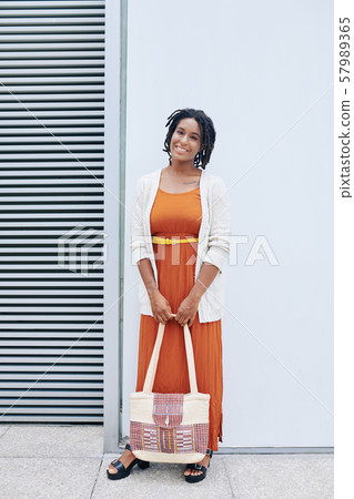 African elegant woman outdoors 57989365