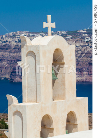 View of the Aegean sea and a traditional bell tower from the ruins of the Castle of Akrotiri 57990459