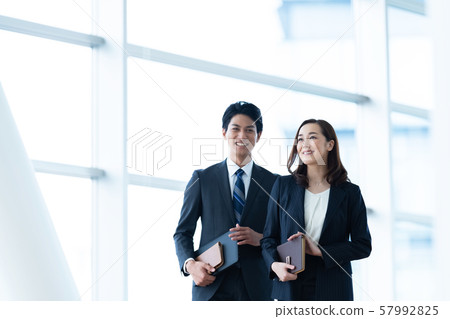 Business image Male employee Female employee 57992825