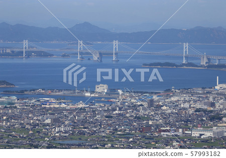 Marugame City and Seto Ohashi Bridge 57993182