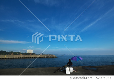 Sea fishing person at Namikiri fishing port in summer Sea fishing person at Namikiri fishing port in summer 57994087