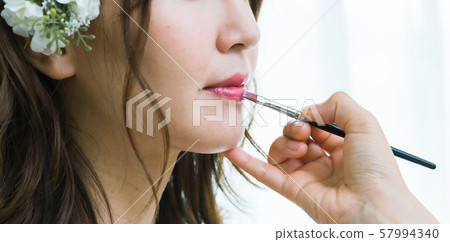 Young woman (bride, wedding dress, bridal image 57994340