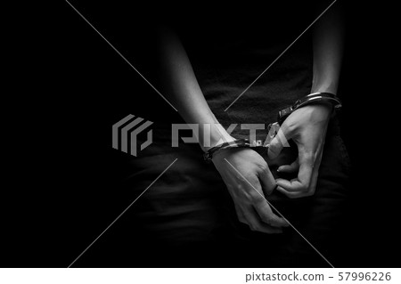 concept human trafficking, hand girl in shackle on isolate black background concept human trafficking, hand girl in shackle on isolate black background 57996226