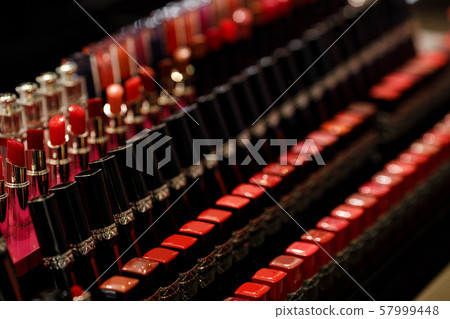 row of lipstick in beauty salon. row of lipstick in beauty salon. 57999448