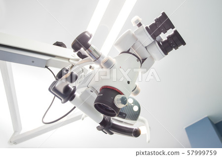 Image of a professional dental endodontic binocular microscope Image of a professional dental endodontic binocular microscope 57999759