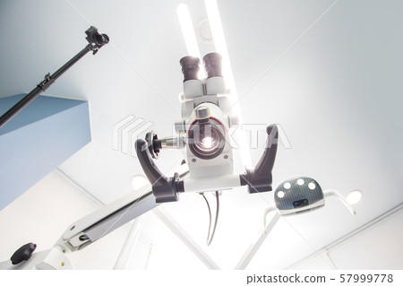 Image of a professional dental endodontic binocular microscope Image of a professional dental endodontic binocular microscope 57999778